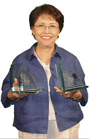 Connie Reza with her Awards